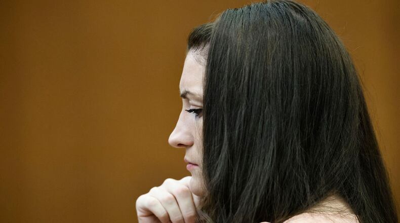 Defendant Lindsay Clancy wipes away tears as she listens to testimony during the Lindsay Clancy murder trial in Plymouth Superior Court, Plymouth, Mass., on Tuesday, Aug. 25, 2026. (Greg Derr/The Patriot Ledger via AP, Pool)
