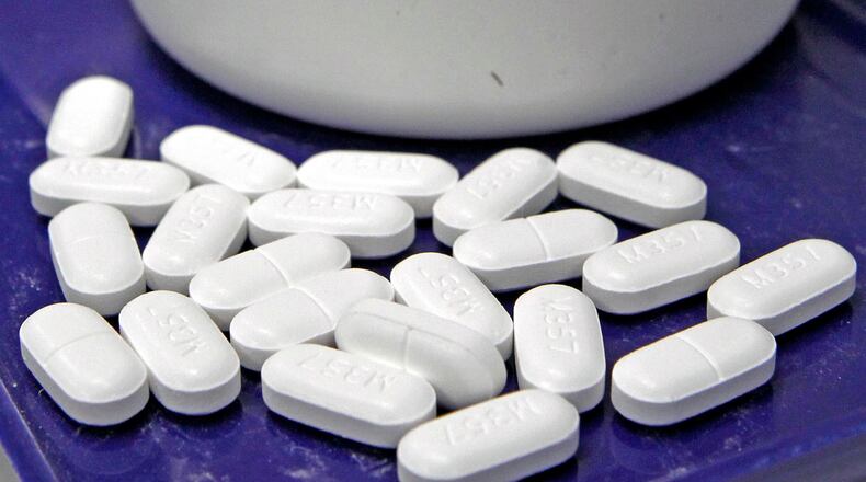 Pills of the painkiller hydrocodone at a pharmacy. (AP Photo/Toby Talbot, File)