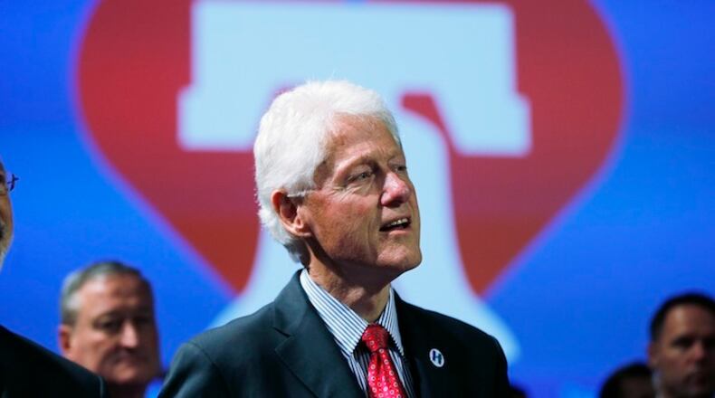 Former President Bill Clinton listens to Democratic presidential candidate Hillary Clinton speak at her presidential primary election night rally, Tuesday, April 26, 2016, in Philadelphia. (AP Photo/Matt Rourke)