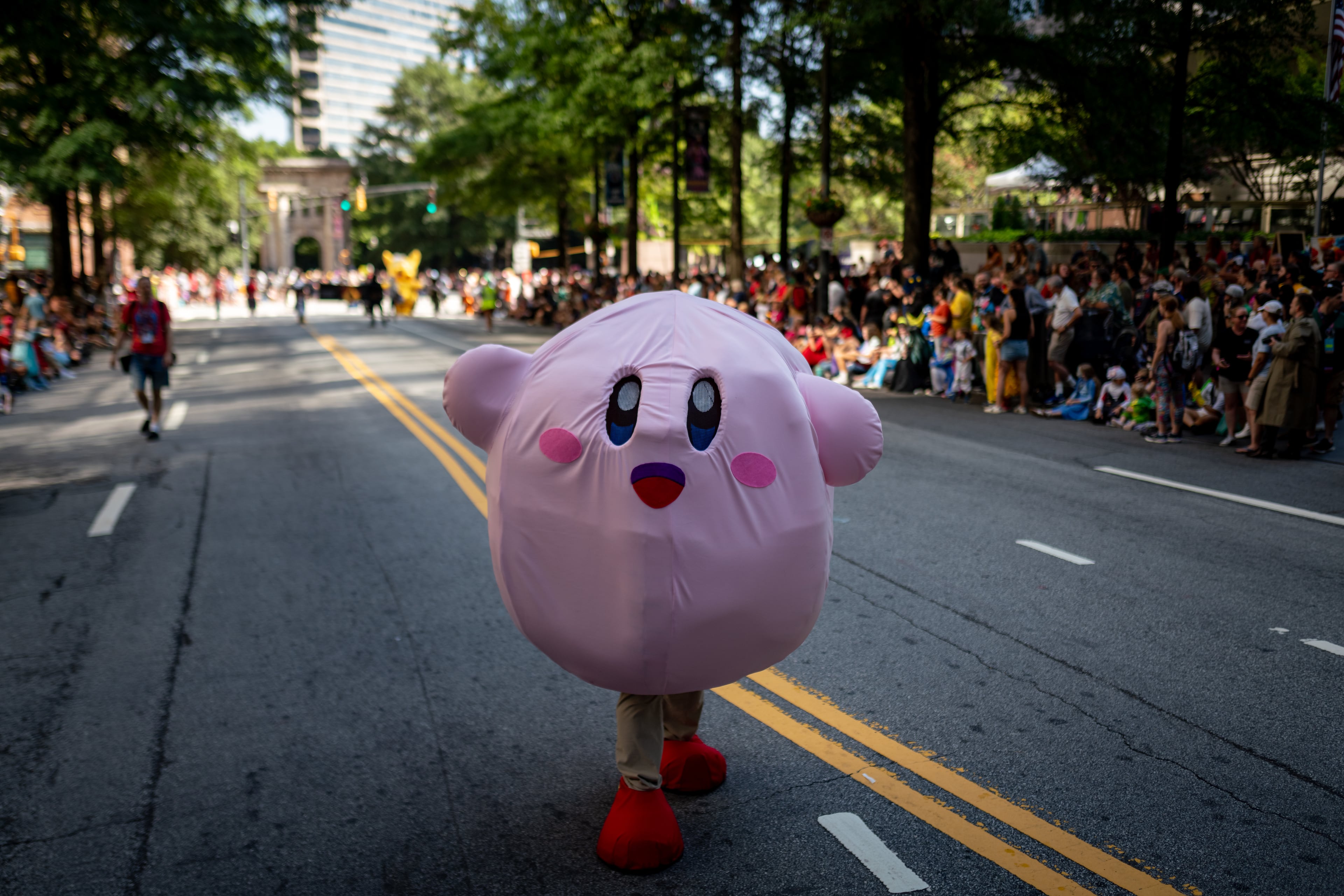 Thousands lined up along Peachtree Street on Saturday morning, August 31, 2024, for the annual Dragon Con parade in Atlanta. (Ben Hendren for The Atlanta Journal-Constitution)