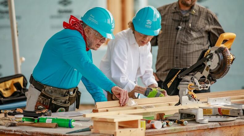 Jimmy and Rosalyn Carter build with volunteers at a 2018 Habitat for Humanity project in St. Joseph County, Ind. An information meeting on how Habitat can help senior homeowners is set for Wednesday, June 26, in Canton. AJC FILE