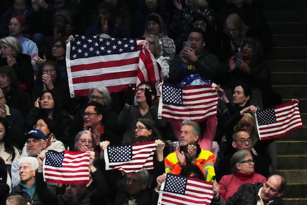 Fans cheer for Amber Glenn of the United States as she performs during the women's short program at the figure skating world championships, Wednesday, March 26, 2025, in Boston. (AP Photo/Charles Krupa)