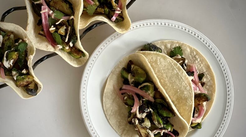 Brussels sprouts tacos are a delicious, healthy meal that fits all of your New Year's resolutions. (Kellie Hynes for The Atlanta Journal-Constitution)