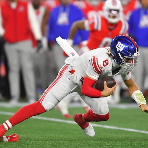 New York Giants quarterback Jaxson Dart (6) is sacked by New England Patriots linebacker Harold Landry III (2) during the second half of an NFL football game Monday, Dec. 1, 2025, in Foxborough, Mass. (AP Photo/Steven Senne)