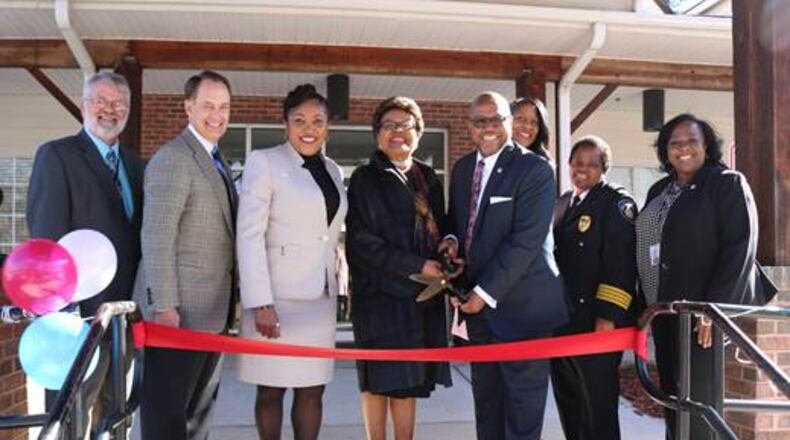 (from left) Fulton County Senior Services Division Manager Kenn Vanhoose, Fulton County Manager Dick Anderson, Union City Councilwoman Christina Hobbs, Fulton County District 6 Commissioner Emma Darnell, Union City Mayor Vince Williams, District 4 Commissioner Natalie Hall, Union City Police Chief Cassandra Jones and Union City Manager Sonja Fillingame