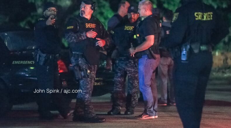 DeKalb County SWAT officers were called to an apartment at the Oak Tree Villas complex off Kensington Road Wednesday morning to assist with serving an arrest warrant.