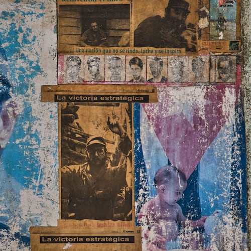 Images of Raul and Fidel Castro adorn the wall of a building that houses an art installation on the Cuban Revolution, in Havana, Cuba, Wednesday, May 20, 2026. (AP Photo/Ramon Espinosa)