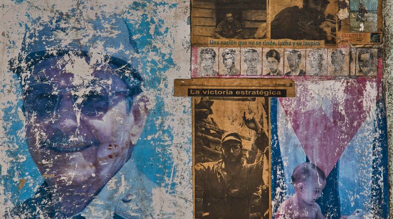 Images of Raul and Fidel Castro adorn the wall of a building that houses an art installation on the Cuban Revolution, in Havana, Cuba, Wednesday, May 20, 2026. (AP Photo/Ramon Espinosa)