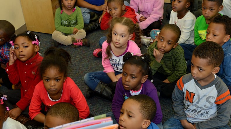 Pre-K students listen to a story at a school in Fulton County.  (AJC File Photo)