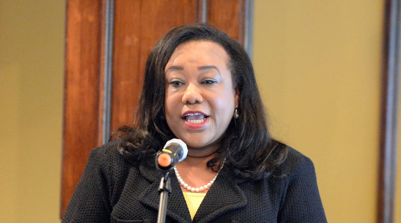 DeKalb County Commissioner Sharon Barnes Sutton speaks during a June 27 debate. Sutton, who faces challenger Steve Bradshaw in a July 26 runoff, has sued the DeKalb Board of Ethics. KENT D. JOHNSON/ KDJOHNSON@AJC.COM