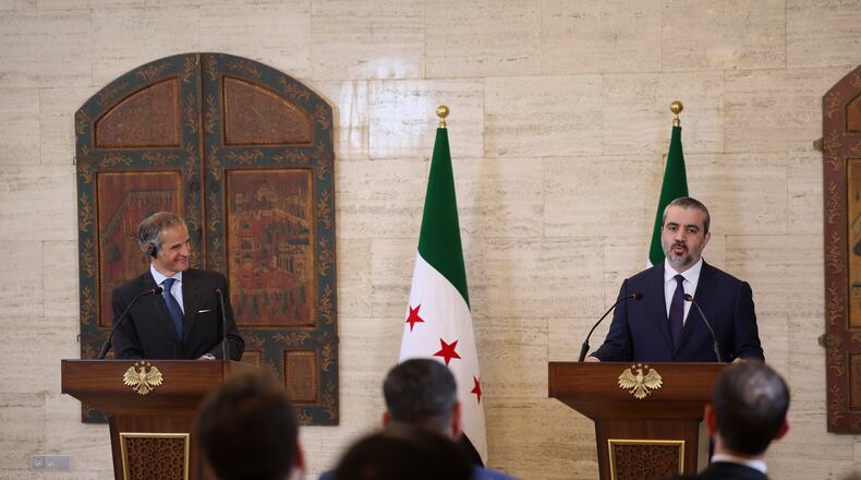 International Atomic Energy Agency's director-general Rafael Mariano Grossi, left, and Syrian Foreign Minister Asaad al-Shibani attend a press conference in Damascus, Syria, Tuesday Aug. 18, 2026. (AP Photo/Ghaith Alsayed)