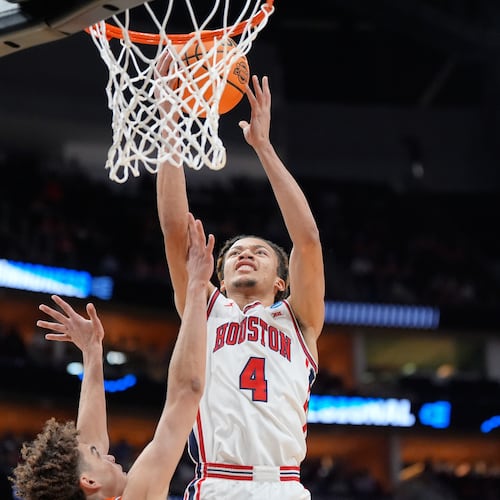 Houston guard Kingston Flemings — pictured playing against Illinois in the Sweet 16 in March — was a consensus second-team All-American as a freshman, when he averaged 16.1 points, 5.2 assists and 4.1 rebounds. (Ashley Landis/AP)