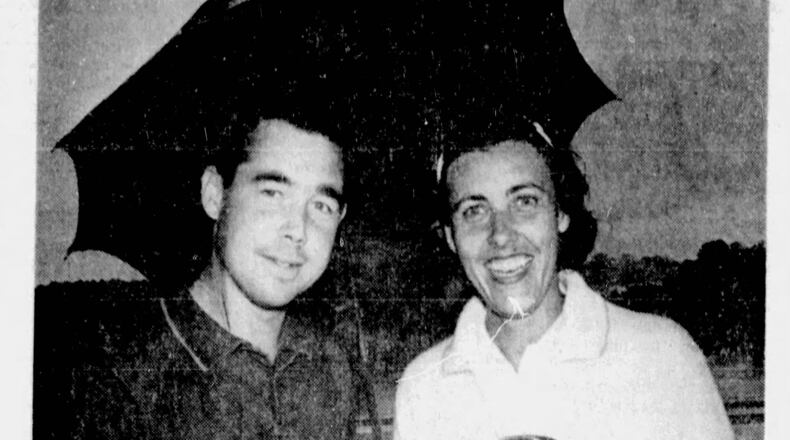 In this file photo from a 1964 edition of The Atlanta Journal, Crawford Henry is shown on the left.