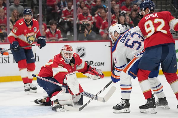 Florida Panthers goaltender Sergei Bobrovsky (72) protects the net as Edmonton Oilers center Jeff Skinner (53) passes the puck during the first period of Game 6 of the NHL hockey Stanley Cup Final Tuesday, June 17, 2025, in Sunrise, Fla. (AP Photo/Lynne Sladky)