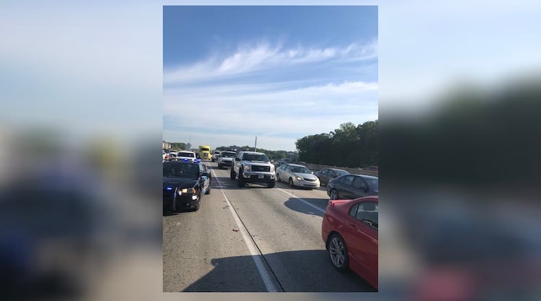 Police blocked multiple lanes of Ga. 400 in Sandy Springs to investigate a series of hit-and-run crashes Tuesday morning.