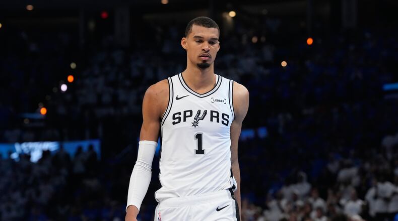 San Antonio Spurs forward Victor Wembanyama reacts after Game 2 in the Western Conference finals NBA basketball playoffs series against the Oklahoma City Thunder Wednesday, May 20, 2026, in Oklahoma City. (AP Photo/Tony Gutierrez)