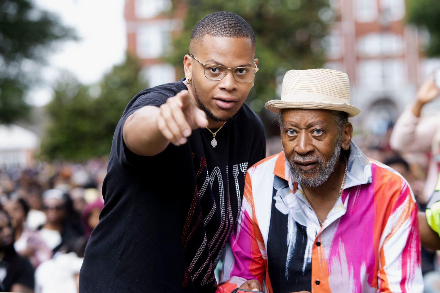 Family members of the Morehouse College class of 2023 search for their graduate during the Morehouse College commencement ceremony on Sunday, May 21, 2023, on Century Campus in Atlanta. The graduation marked Morehouse College's 139th commencement program. CHRISTINA MATACOTTA FOR THE ATLANTA JOURNAL-CONSTITUTION
