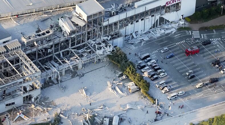 This aerial image shows the damaged AEON Mall after an earthquake in Kashima, Kumamoto prefecture, southern Japan, Tuesday, July 28, 2026. (Kyodo News via AP)