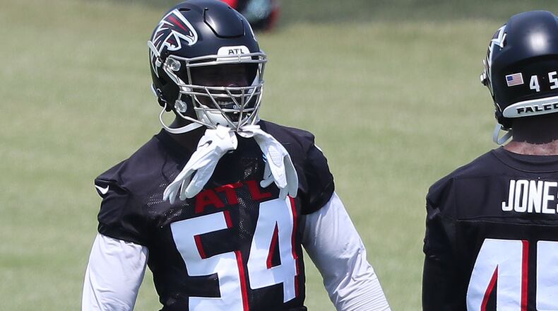 Falcons linebackers Foyesade Oluokun (left) and Deion Jones work together during OTAs Tuesday, May 25, 2021, at the team training facility in Flowery Branch. (Curtis Compton / Curtis.Compton@ajc.com)