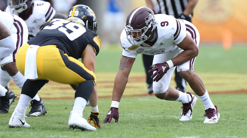 Former Stephenson player Montez Sweat (right) of  Mississippi State is projected as a first-round pick in the NFL Draft.