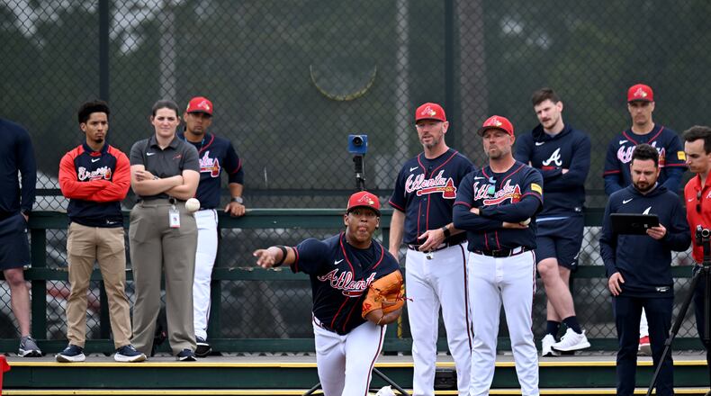 With the Braves' slew of injuries on the pitching staff, Didier Fuentes — pictured throwing in February — may make the roster for opening day Friday against the Royals. (Hyosub Shin/AJC)