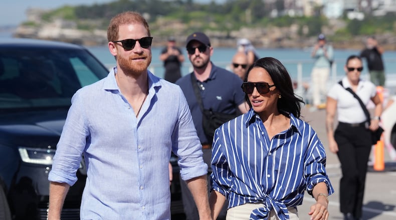FILE - Prince Harry, and Meghan, the Duke and Duchess of Sussex, arrive for an event, during a visit to Bondi Beach, Australia, April 17, 2026. (Jonathan Brady/Pool Photo via AP, File)