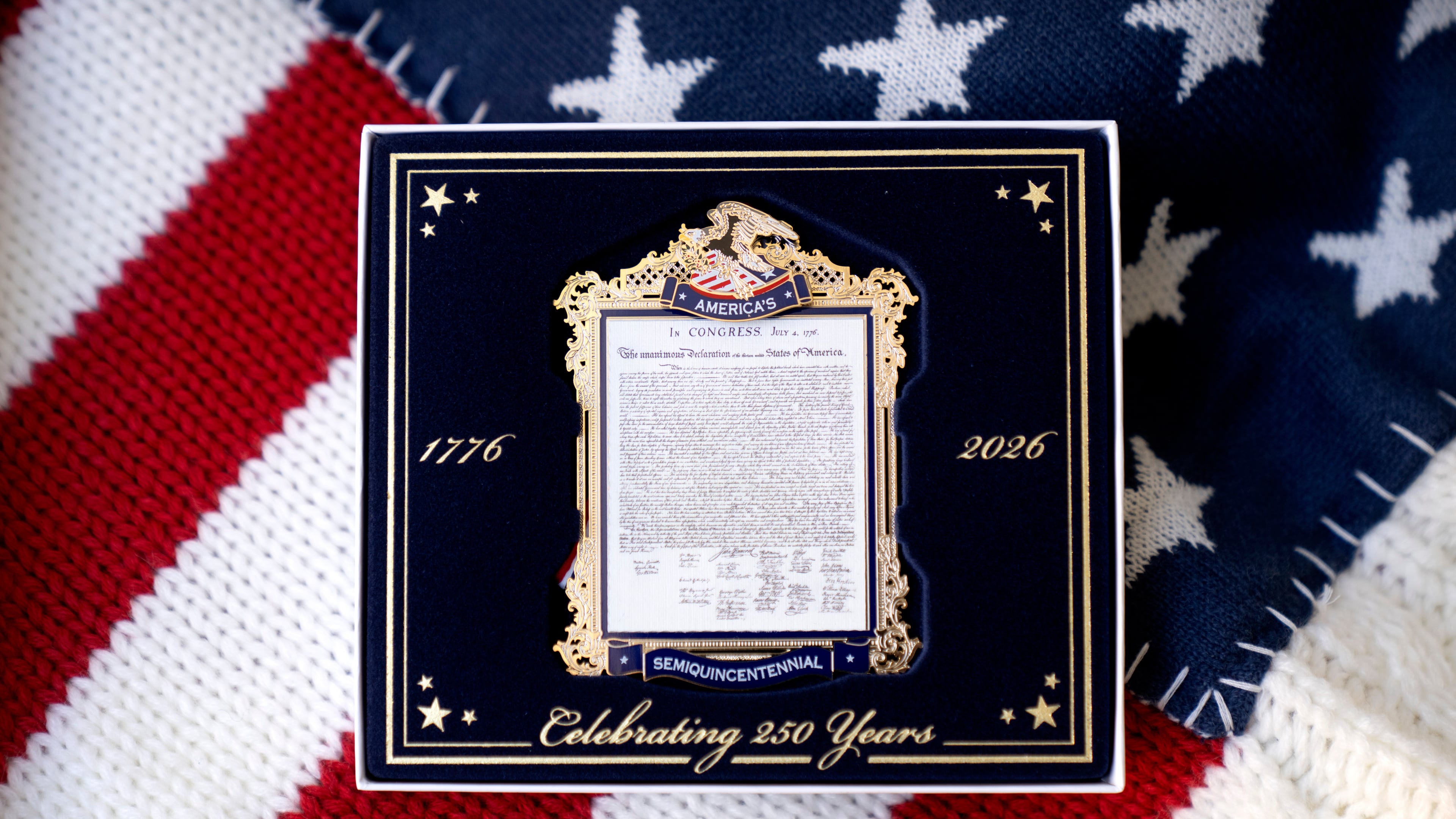 A commemorative ornament released by America250 as part of events leading up to the 250th anniversary of the signing of the Declaration of Independence in 1776, is photographed Thursday, Nov. 13, 2025, in Washington. (AP Photo/Mark Schiefelbein)
