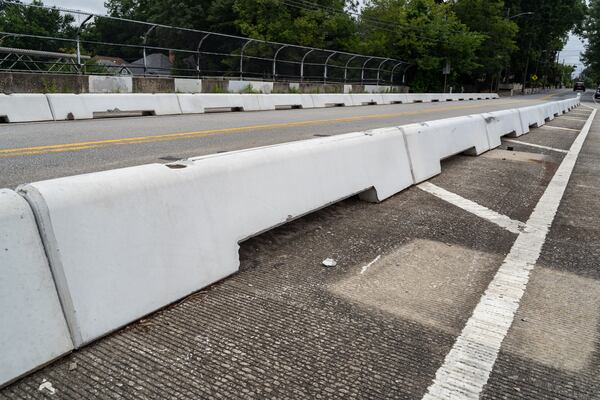 Concrete bike lane barriers line Cherokee Avenue Southeast on Monday, July 13, 2026.  (Ben Hendren for the AJC)