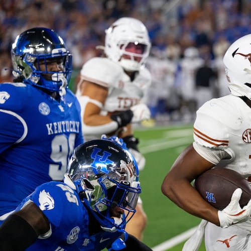 Texas defensive back Ryan Niblett (21) returns a punt in the second quarter of an NCAA college football game against Kentucky, Saturday, Oct. 18, 2025, in Lexington, Ky. (AP Photo/Michael Swensen)