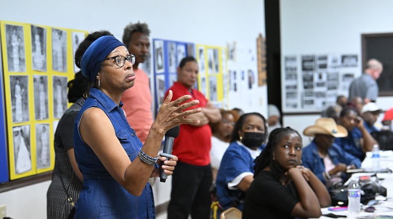 Alphermease Moore asks a question after Marilyn Marks, executive director for the Coalition for Good Governance, gave a presentation during Town hall meeting over elections breach in Coffee County at Gaines Chapel AME Church, Saturday, August 19, 2023, in Douglas, GA. The alleged conspiracy to overthrow the 2020 presidential election stretched from Donald Trump’s lawyers in Washington to his sympathizers in South Georgia’s Coffee County, resulting in charges against four of those involving the tampering of voting software and ballots. (Hyosub Shin / Hyosub.Shin@ajc.com)