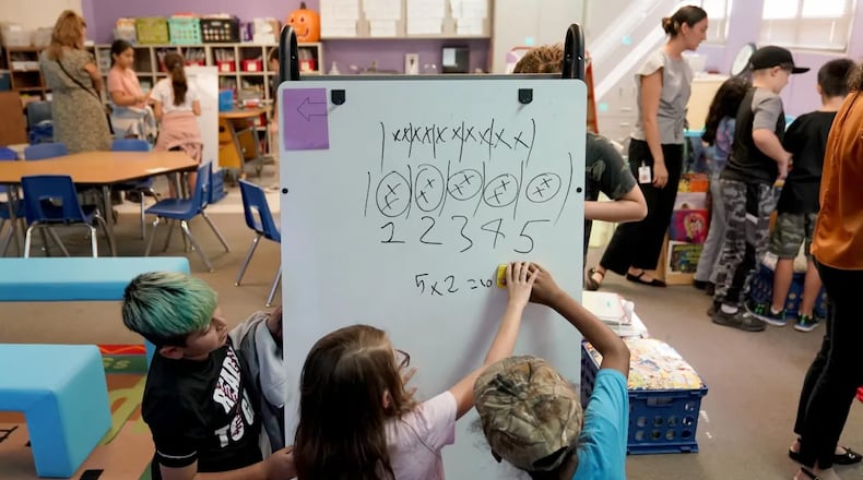 Students at Whittier Elementary School, in Mesa, Arizona, attend classes led by a team of teachers who have different skills and expertise. Credit: Matt York/Associated Press