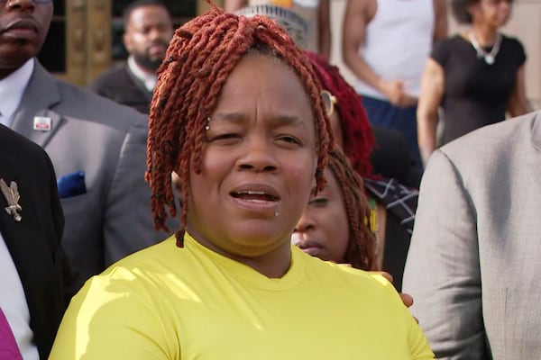 In this photo made from video provided by WHAS-11 News, Breonna Taylor's mother, Tamika Palmer, speaks outside the federal courthouse, Monday, July 21, 2025, in Louisville, Ky. (WHAS-11 News via AP)