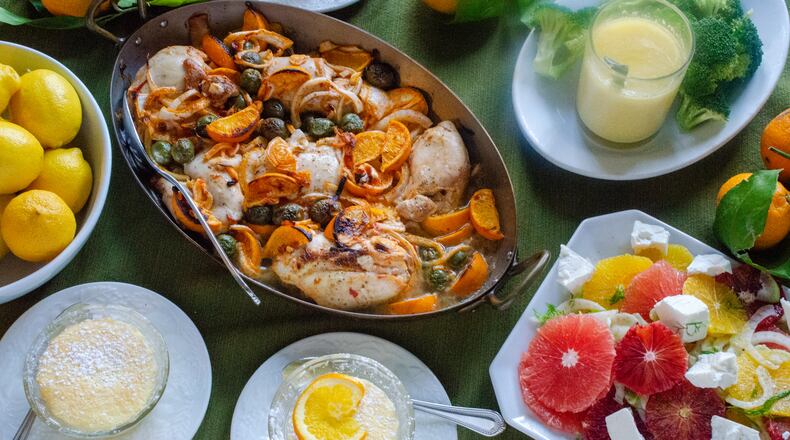 Big, bold, bright flavors will put some zest in your cooking with recipes for (clockwise, from upper left) Spicy Chicken with Clementines, Whole Meyer Lemon Dressing, Mixed Citrus Salad with Fennel and Feta, and Citrus Pudding Cakes. (Virginia Willis for The Atlanta Journal-Constitution)
