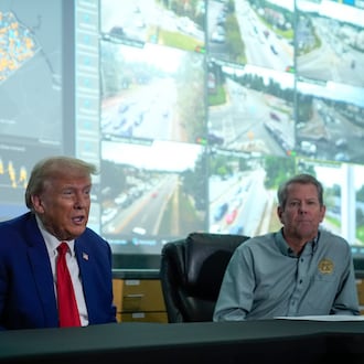 Gov. Brian Kemp (right) and then-Republican presidential nominee Donald Trump hold an October 2024 news conference after visiting areas impacted by Hurricane Helene in Evans. (Evan Vucci/AP)