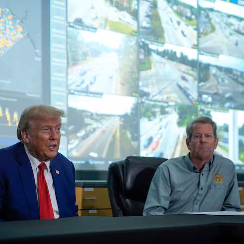 Gov. Brian Kemp, right, and then-Republican presidential nominee Donald Trump hold an October 2024 news conference after visiting areas impacted by Hurricane Helene in Evans. (Evan Vucci/AP)