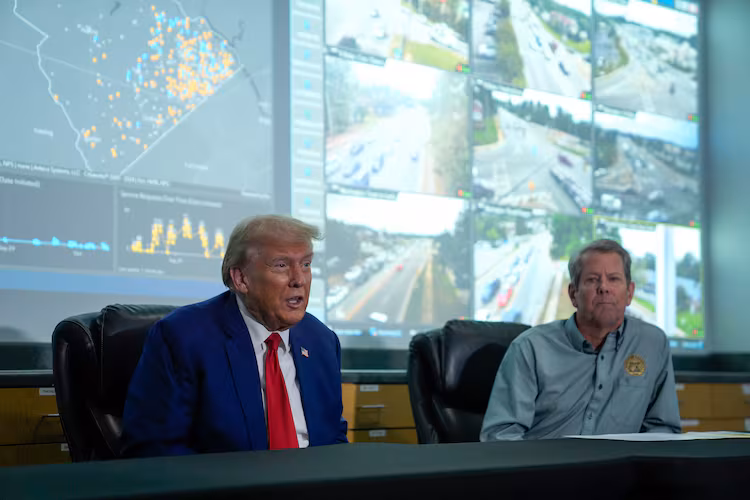 Gov. Brian Kemp (right) and then-Republican presidential nominee Donald Trump hold an October 2024 news conference after visiting areas impacted by Hurricane Helene in Evans. (Evan Vucci/AP)