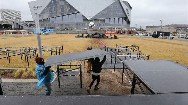 The stage is set up on Sunday, December 9, 2018, at the Home Depot Backyard outside Mercedes-Benz Stadium for Monday’s Atlanta United parade celebration. The city will join the team and fans in celebrating the team winning the MLS Cup on Monday. (Photo: Curtis Compton/ccompton@ajc.com)