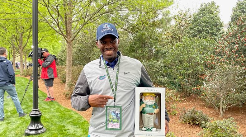 Masters patron Derrick Terrell of Gainesville, Fla., was one of the lucky spectators to come away with a gnome from the Augusta National gift shop on Tuesday.