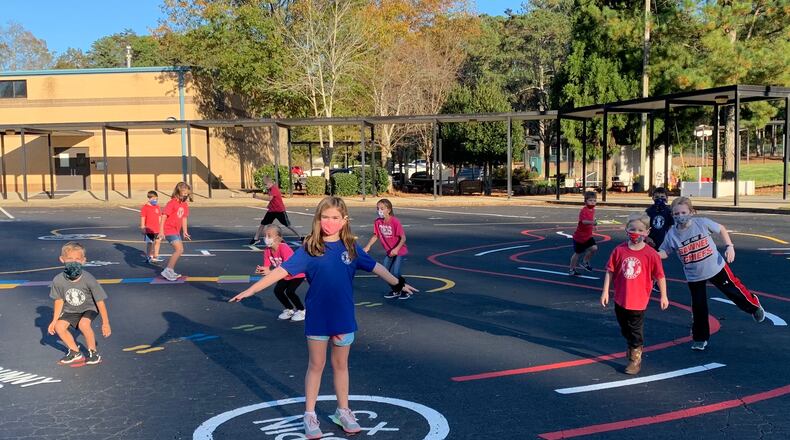 The blackttop area around Sawnee Elementary in Cumming provided the canvas for a new activities area.