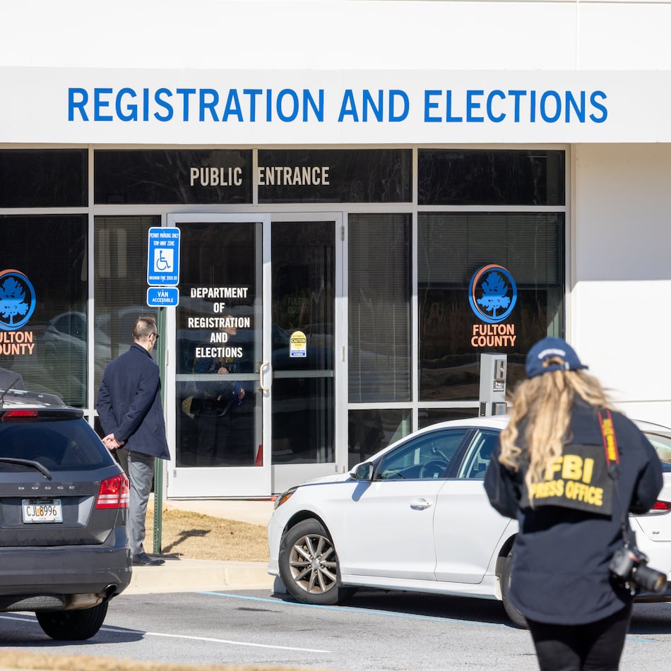 FBI public affairs officer Jenna Sellitto approaches the Fulton County Election Hub and Operation Center in Union City on Wednesday, Jan. 28, 2026. (Arvin Temkar/AJC)