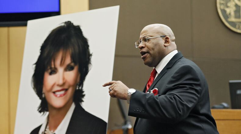 4/17/18 - Atlanta - Chief Assistant District Attorney Clint Rucker, with a photo of Diane McIver behind him, makes closing arguments for the prosecution today during the Tex McIver murder trial at the Fulton County Courthouse. Bob Andres bandres@ajc.com
