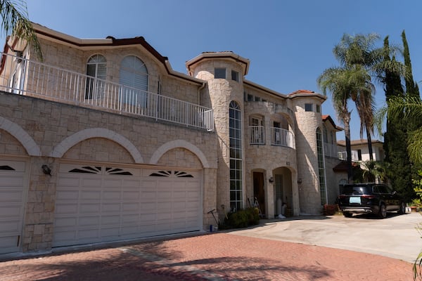The home of Silvia Zhang and Guojun Xuan is seen on Wednesday, July 16, 2025, in Arcadia, Calif., where a number of children were removed from the couple's home after a child abuse allegation in May, according to Arcadia police. (AP Photo/Jae C. Hong)