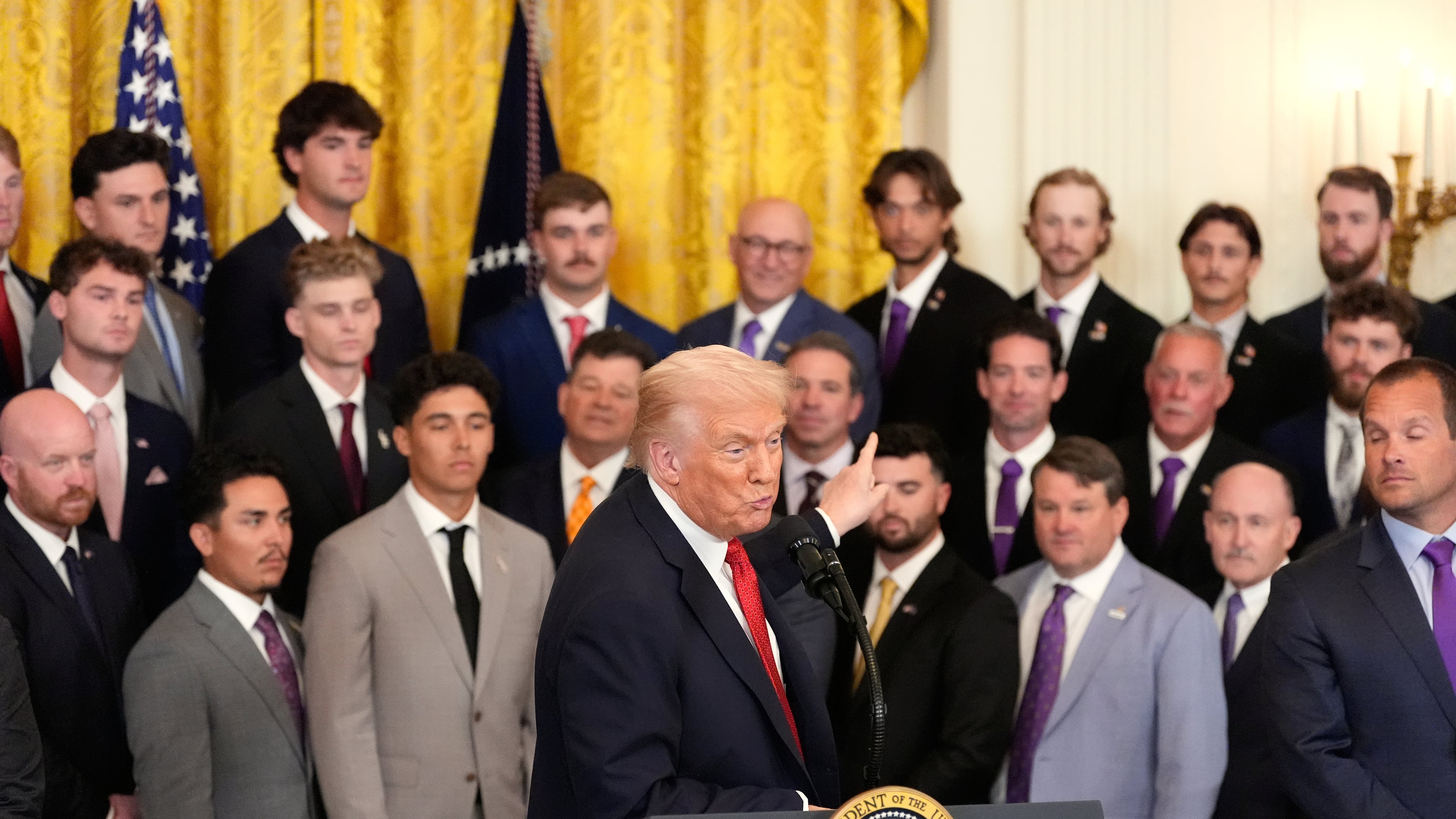 President Donald Trump speaks during an event to welcome the 2025 LSU and LSU-Shreveport national champion baseball teams in the East Room of the White House, Monday, Oct. 20, 2025, in Washington. (AP Photo/Alex Brandon)