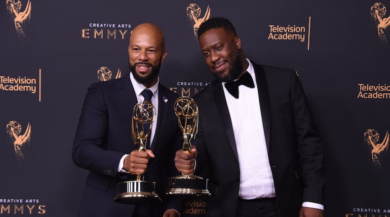 Common, left, and Robert Glasper pose in the press room with the award for outstanding original music and lyrics for "13th Song Title: Letter to the Free" during night one of the Creative Arts Emmy Awards at the Microsoft Theater on Saturday, Sept. 9, 2017, in Los Angeles. (Photo by Richard Shotwell/Invision/AP)
