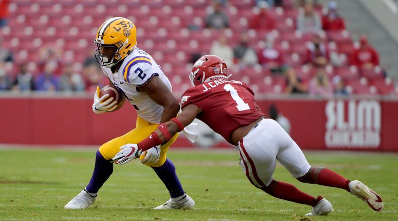 This Nov. 21, 2020, file photo shows LSU tight end Arik Gilbert against Arkansas in Fayetteville, Ark. (AP Photo/Michael Woods, File)