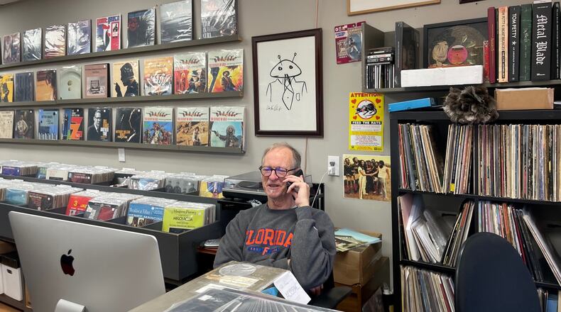 Don Radcliffe, proprietor of Ella Guru Record Shop in Dekalb County, has been in the record business for more than 40 years. He makes a living off used records that have been "set free." Photo by Bill Torpy