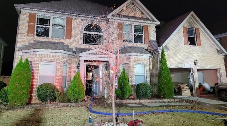 A man was charged with felony arson and domestic violence after he set fire to a Gwinnett County home while his wife, children and mother-in-law were still inside, authorities said.