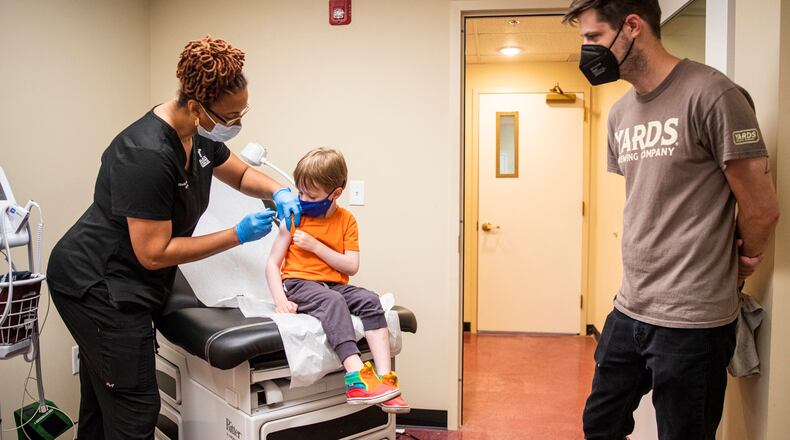 In this file photo, Shelah McMillan, Nursing Supervisor, gives Oliver Johnson, 3, his covid vaccine shot with his family at Doctor Ala Stanford Center for Health Equity in Philadelphia, Pa. (Tyger Williams/The Philadelphia Inquirer/TNS)