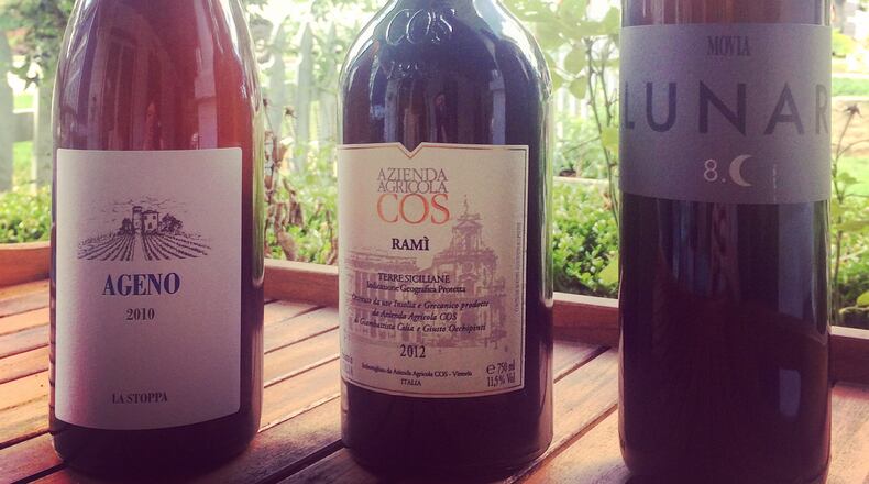 Orange wine refers to a style of white wine making where the grape skin is left in contact with the juice after pressing. Credit: Beth McKibben