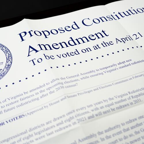 A poster on the Virginia redistricting referendum is seen during voting at Mason Square, Tuesday, April 21, 2026, in Alexandria, Va. (AP Photo/Julia Demaree Nikhinson)
